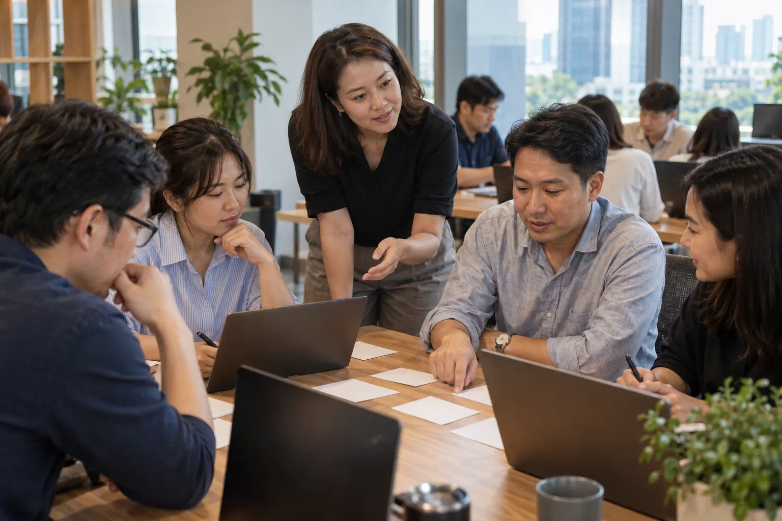 ภาพจำลองทีมงานไทยร่วมกันฝึกออกแบบการใช้ AI